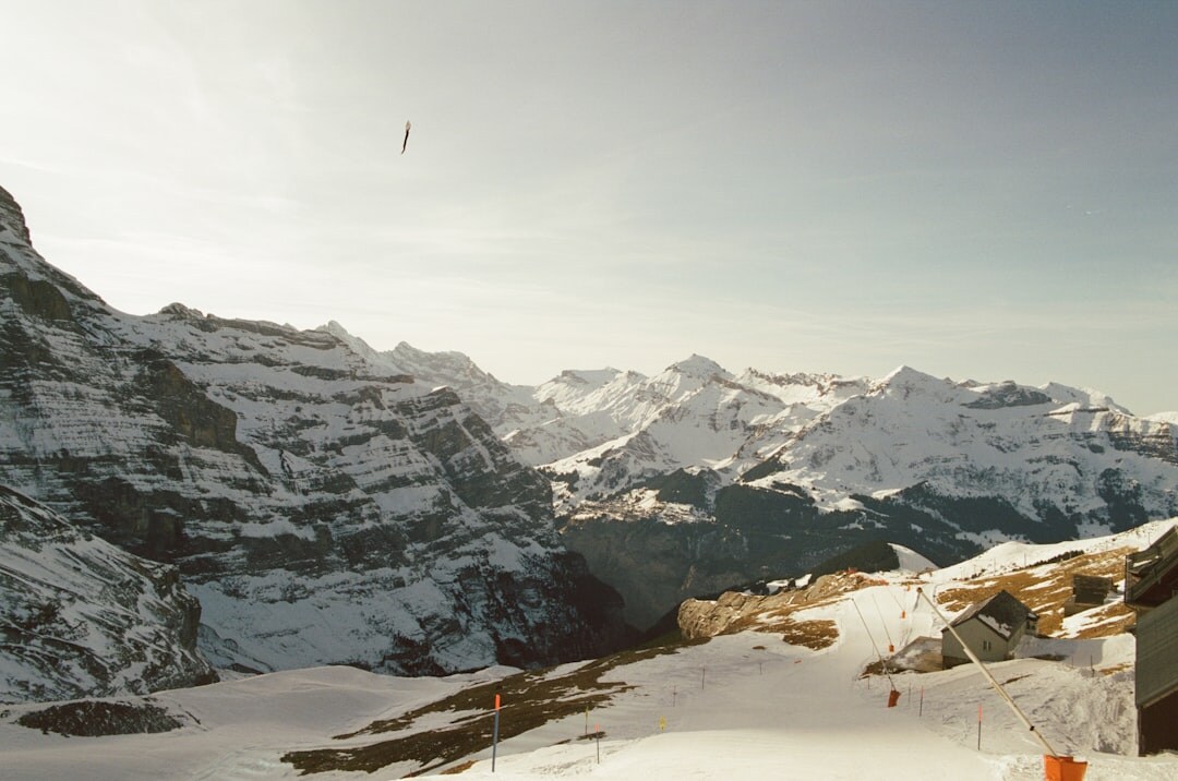 Snow-covered mountain peaks above a Swiss ski resort village